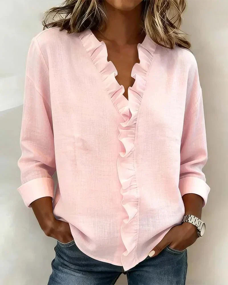 Delilah - Blus med volang och v-ringning