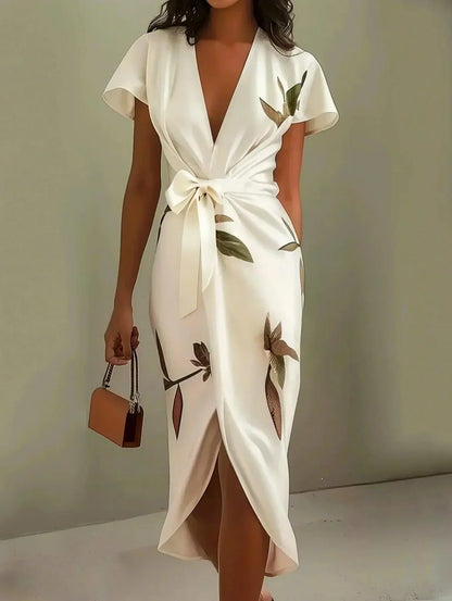 Evie - Elegant blommig omlottklänning