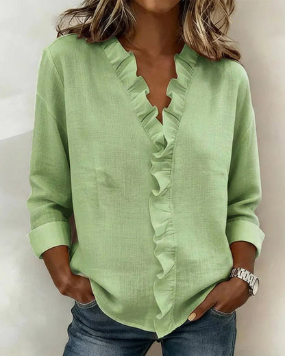 Delilah - Blus med volang och v-ringning