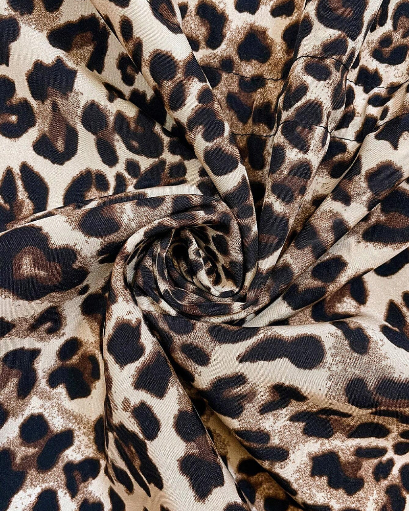 Vändbar kappa med leopardmönster och huva