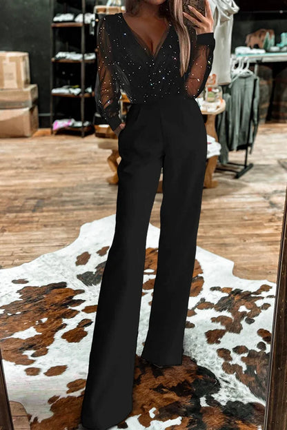 Islie | Jumpsuit med transparenta ärmar och vida ben