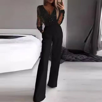 Islie | Jumpsuit med transparenta ärmar och vida ben