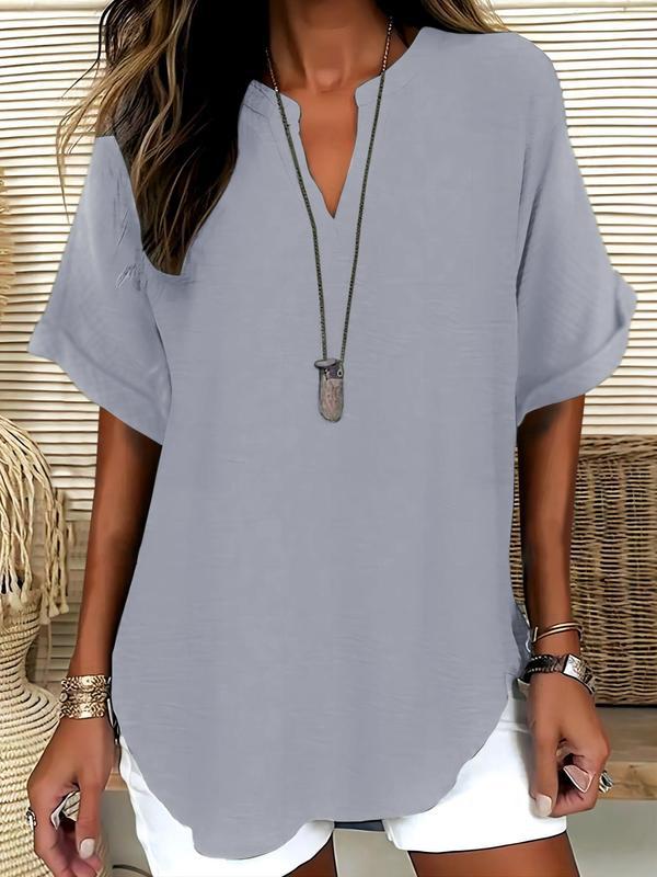 GENNEVA™ – Avslappnad, enkel blus med korta ärmar