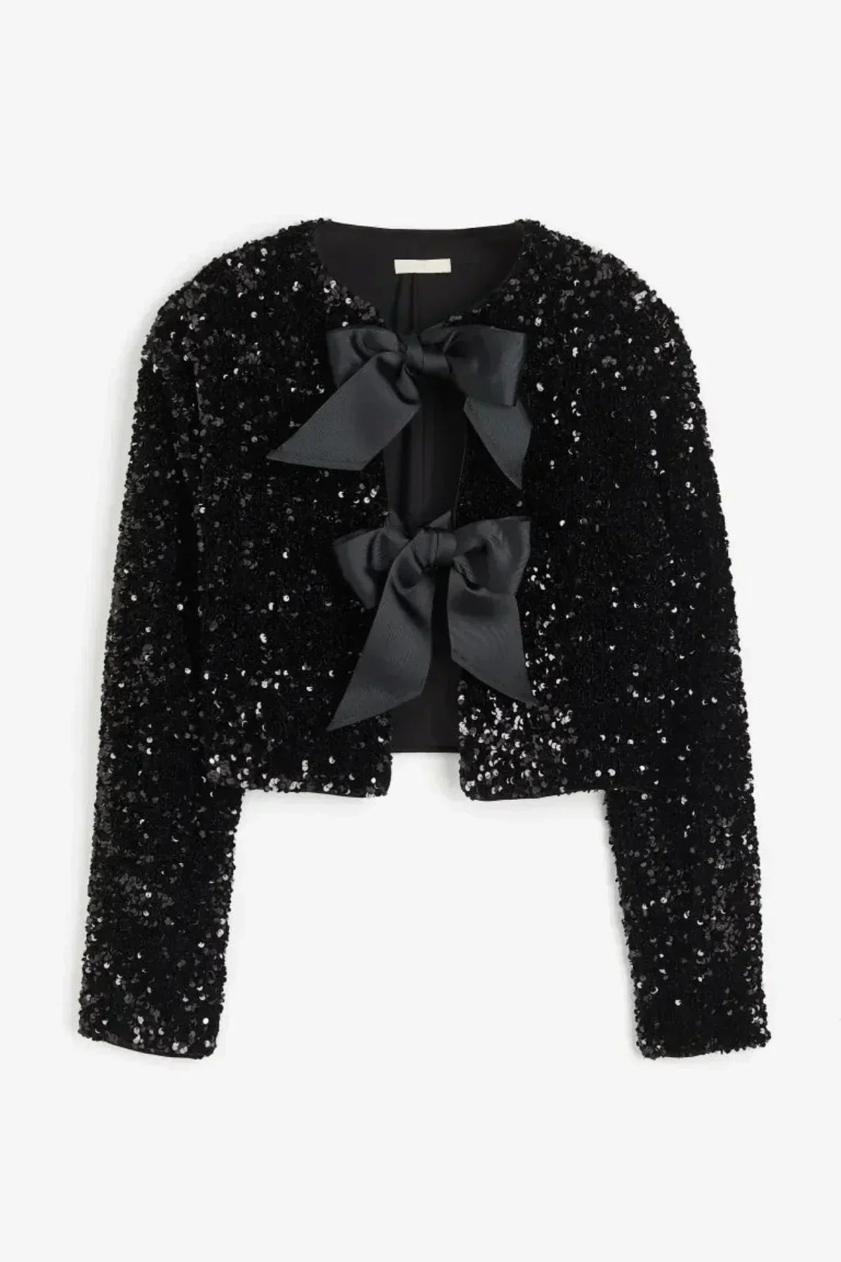 Anwen | Elegant blus med rosettdetalj