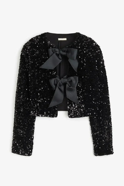 Anwen | Elegant blus med rosettdetalj