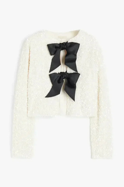 Anwen | Elegant blus med rosettdetalj