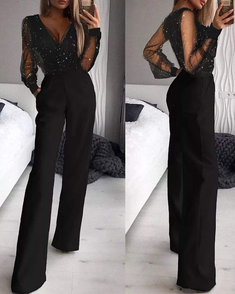 Islie | Jumpsuit med transparenta ärmar och vida ben