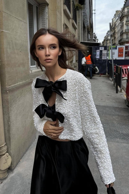 Anwen | Elegant blus med rosettdetalj